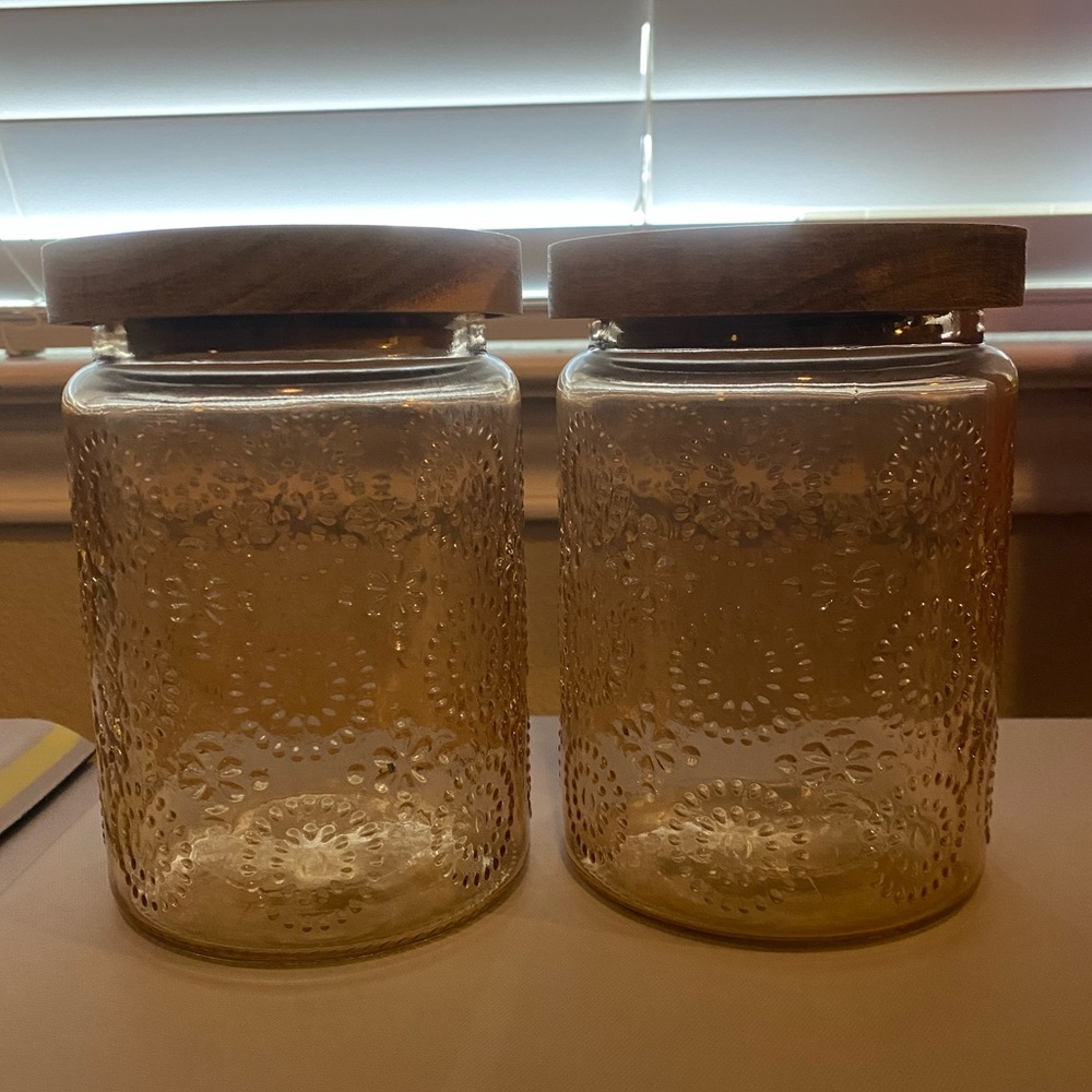 Set of Two Embossed Glass Jars with Wooden Lids - EUC - Light Brown Color